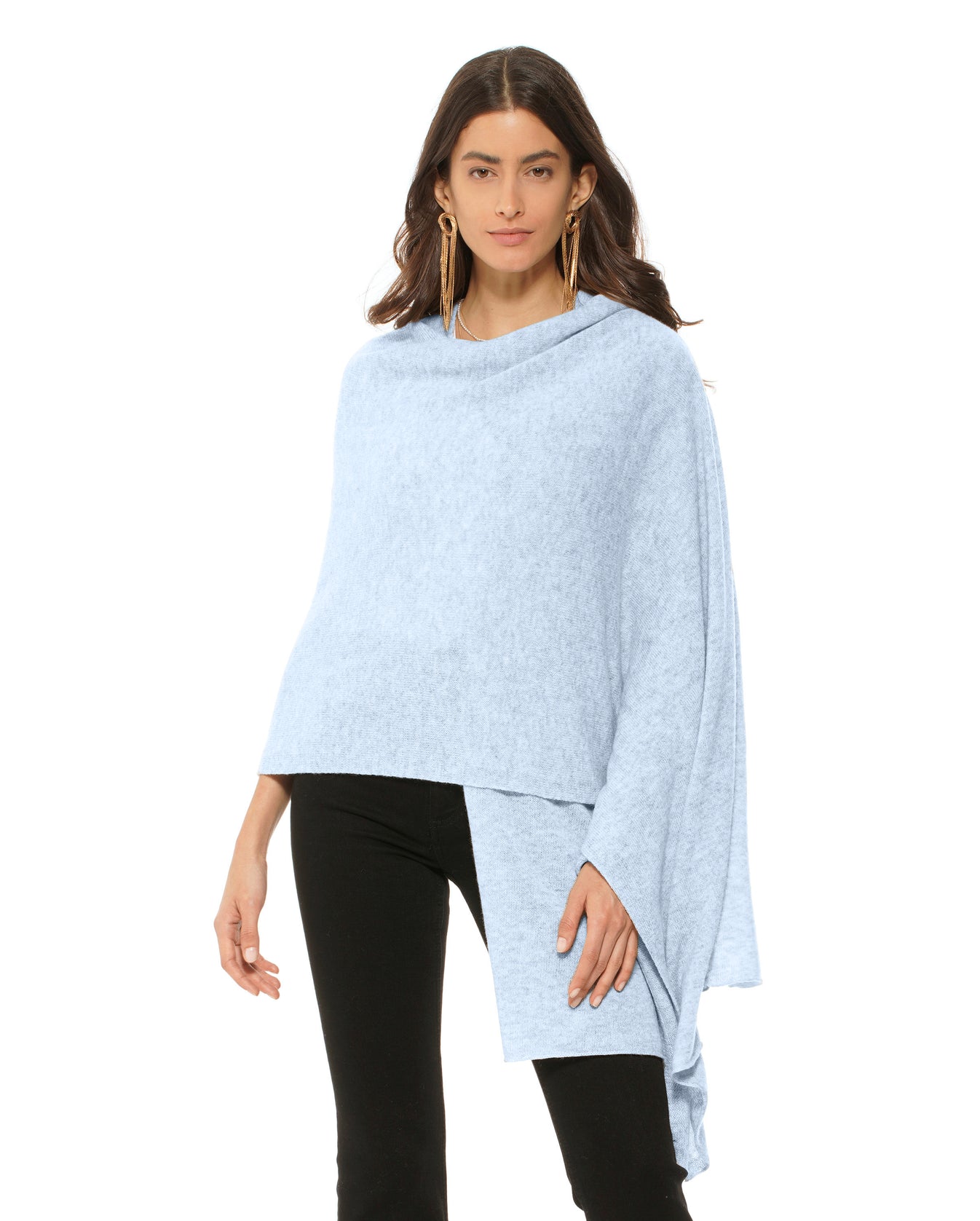 Pastel blue maxi cashmere wrap folded casually over a white shirt, natural daylight.