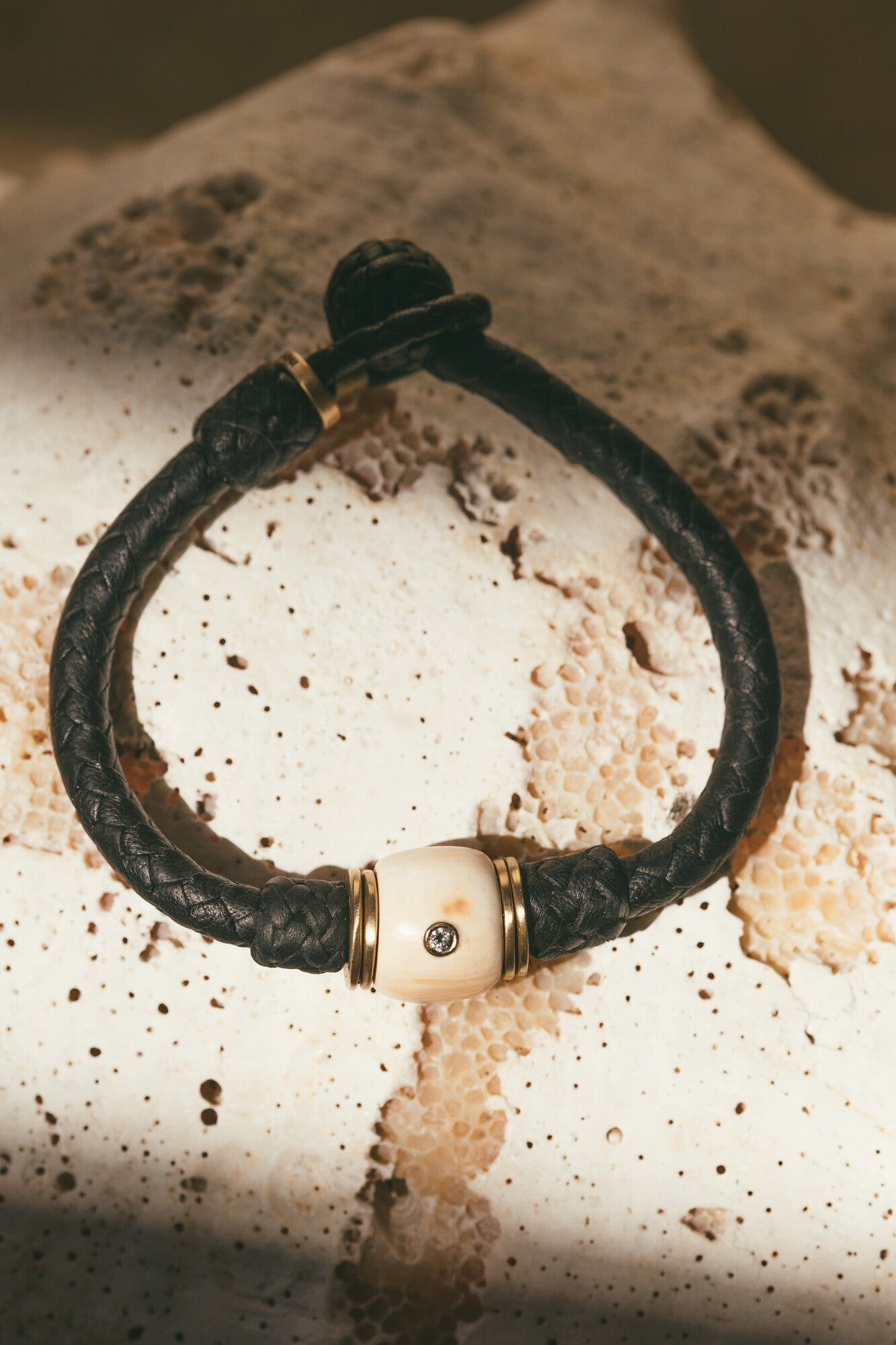 14K GOLD VINTAGE CONCH WITH DIAMOND LEATHER BRACELET WITH A BLACK STRAP