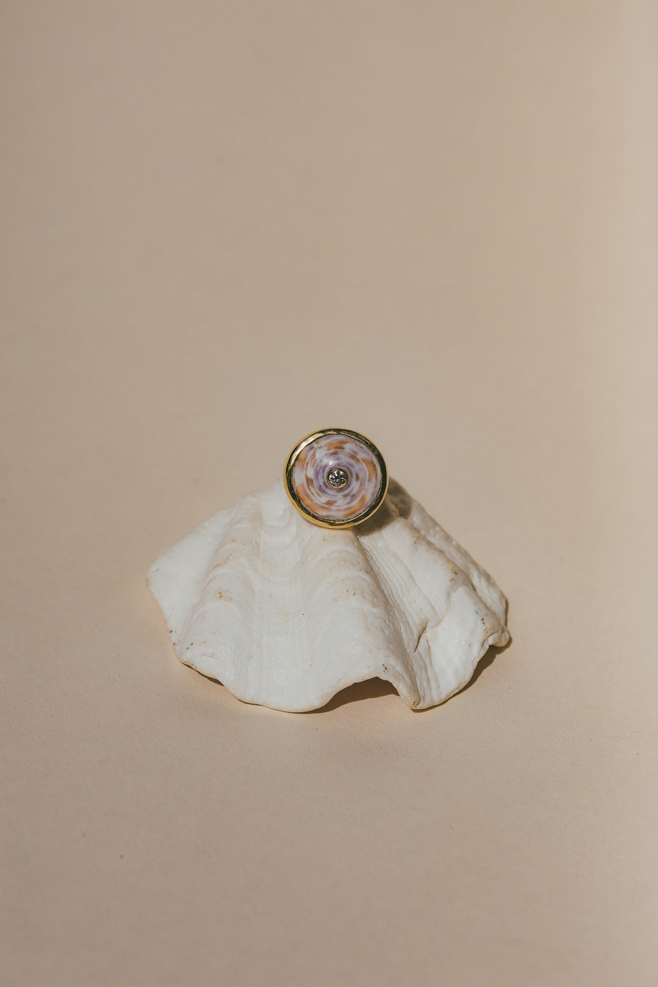 THE 18K GOLD PUKA RING WITH DIAMOND-ONE-OF-A-KIND ON A SEA SHELL