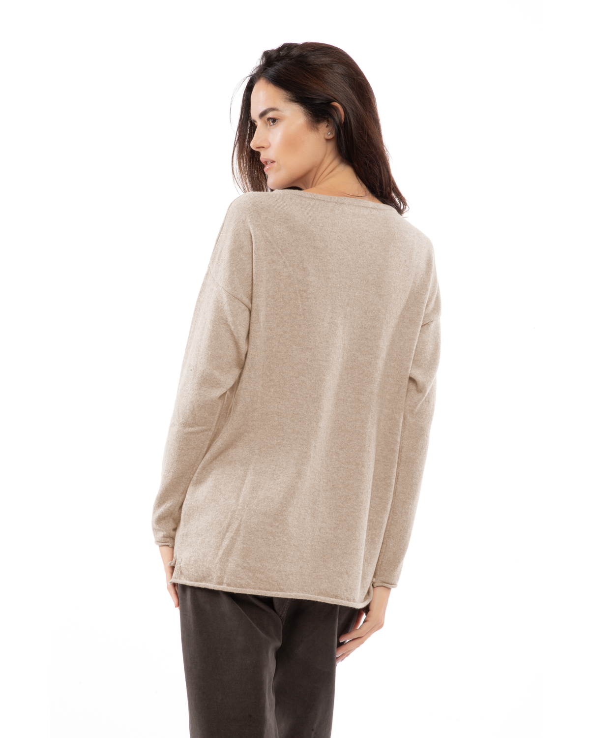 Back view of a model wearing a cashmere relaxed maxi boatneck sweater in beige