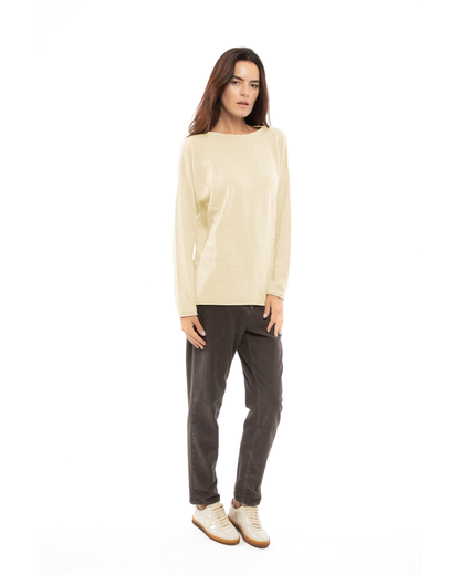 Model wearing the butter yellow relaxed cashmere boatneck sweater