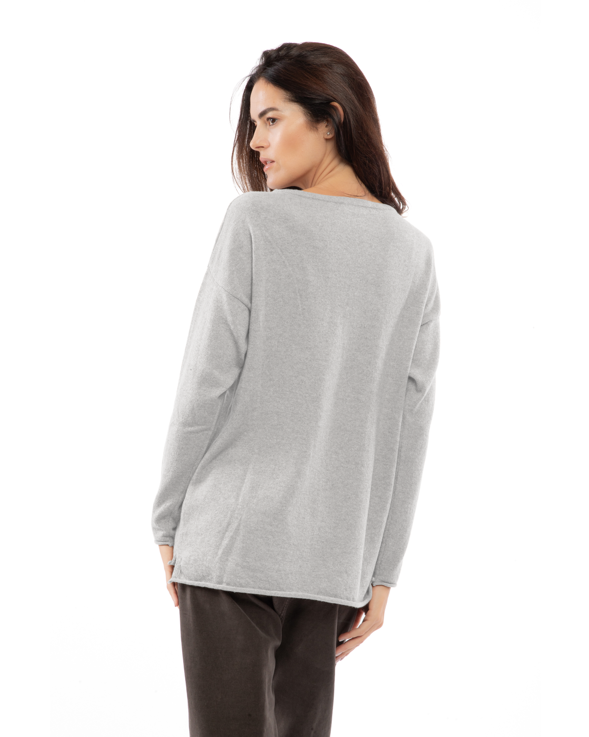 Light gray cashmere boatneck sweater, shown from behind on a model.