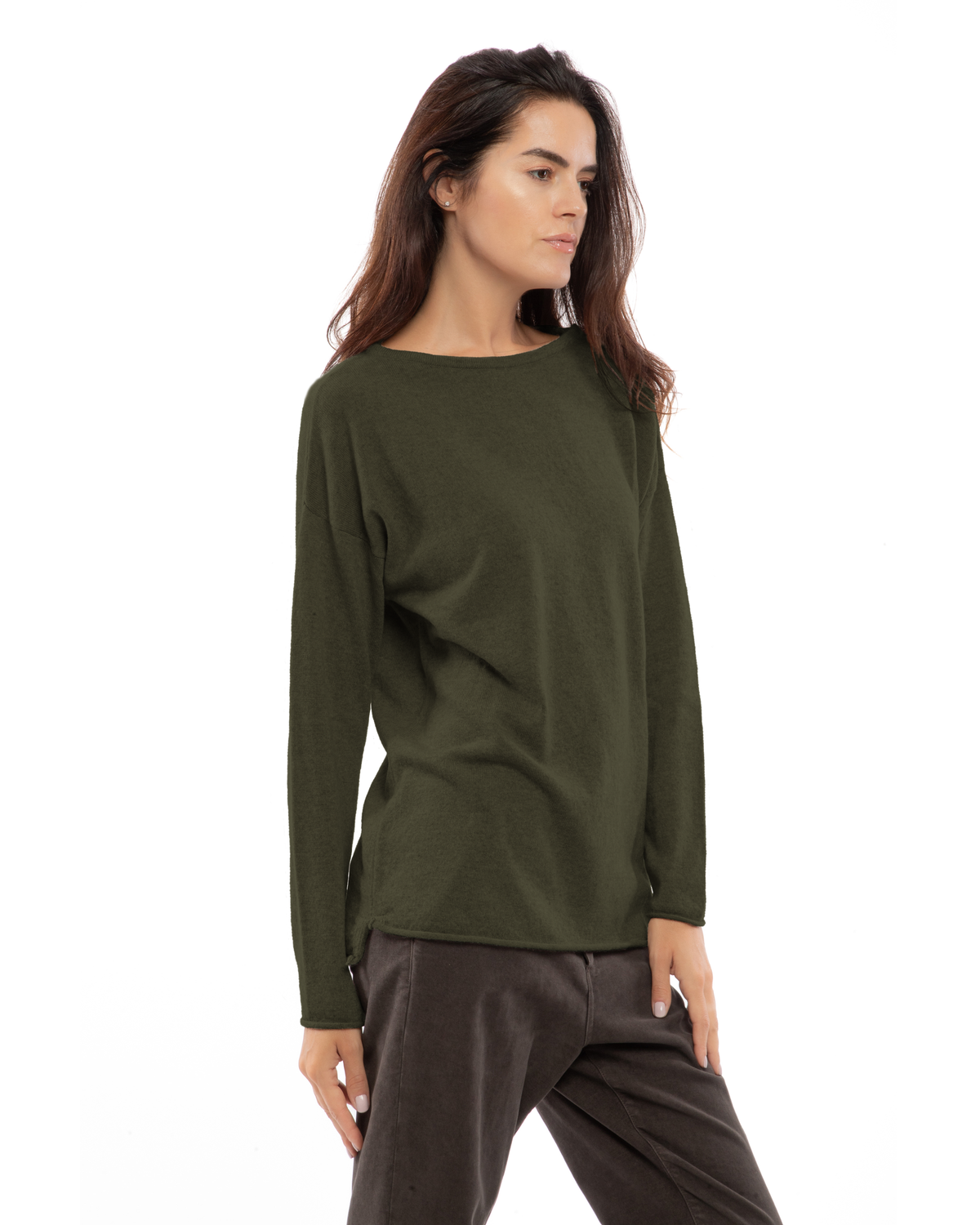 Olive green cashmere boatneck sweater, shown at an angle on a model.