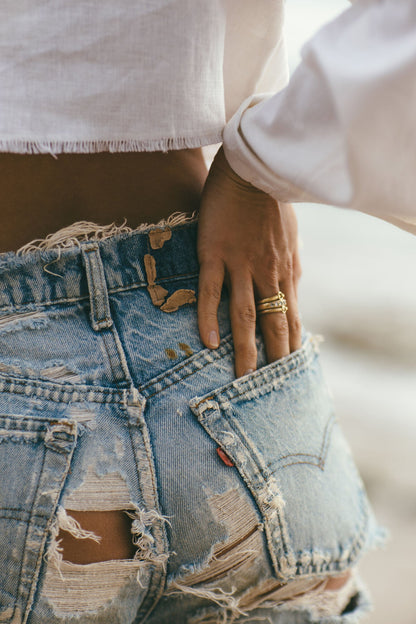 THE GOLD HANSEN RING  ON A MODELS HAND 