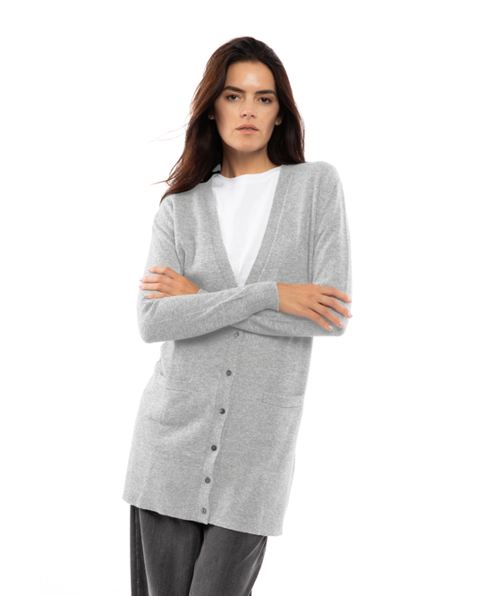 Model wearing the Light Gray long cashmere cardigan over a white top, with arms crossed in front.