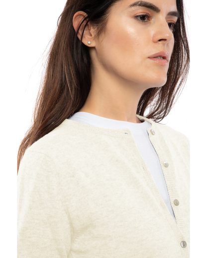 Milk White cashmere crewneck cardigan, close-up of the crew neckline and button placket