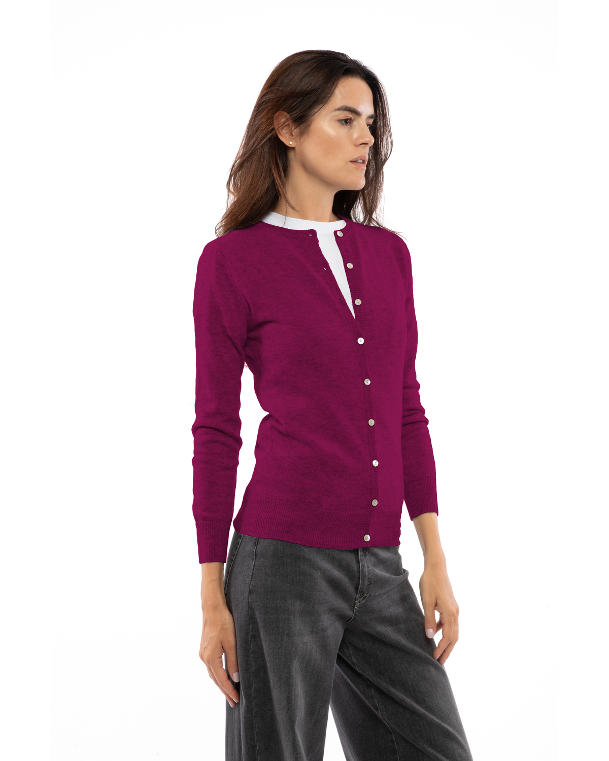 Magenta cashmere crewneck cardigan, three-quarter front view on a model
