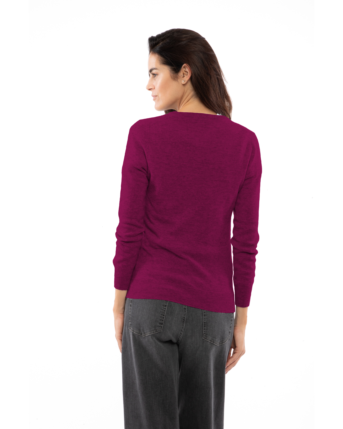 Magenta cashmere crewneck cardigan, rear three-quarter view on a model