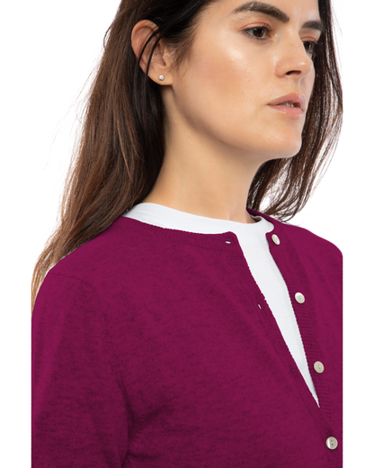 Magenta cashmere crewneck cardigan, close-up of the crew neckline and button placket
