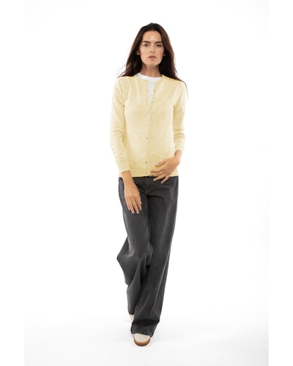 Butter Yellow cashmere crewneck cardigan, full-length front view styled with dark trousers
