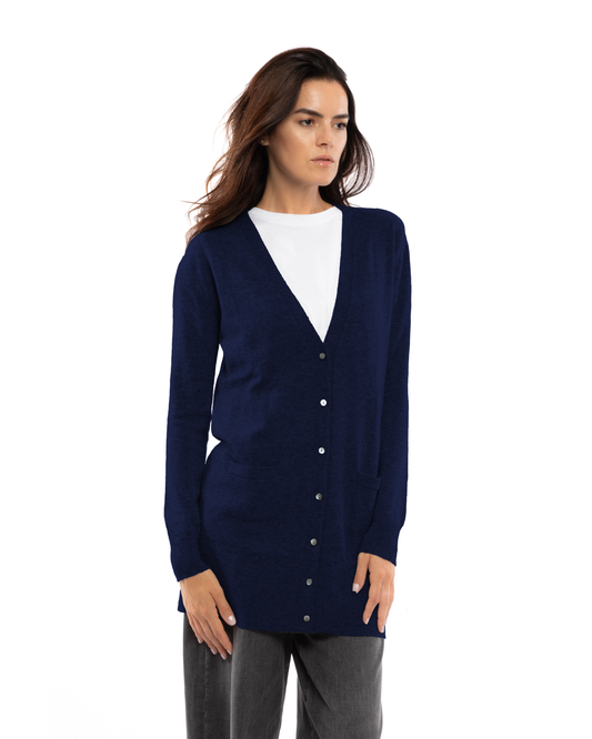 Blue long cashmere cardigan, on a model, front view showing the long button-front silhouette