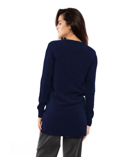 Blue long cashmere cardigan, on a model, back view showing the long hem and sleeves