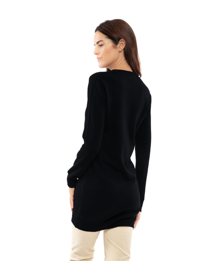Black cashmere crew neck dress, rear three-quarter view on a model