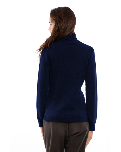 Women's cashmere raglan sleeve turtleneck sweater in Blue, back view on a model