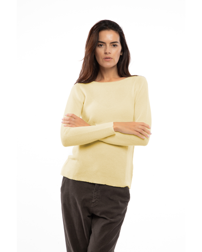 Butter Yellow cashmere links stitch boat neck sweater, on a model, front view showing the boat neckline and long sleeves