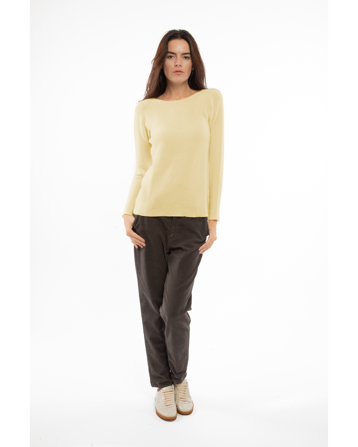 Butter Yellow cashmere links stitch boat neck sweater, full-length outfit on a model, front view