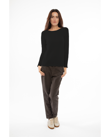 Black cashmere links stitch boat neck sweater, full-length outfit on a model, front view