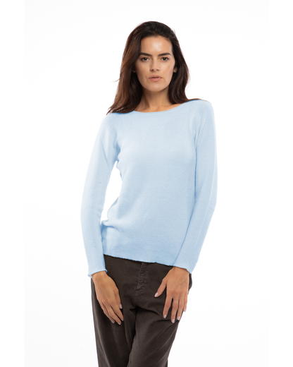 Baby Blue cashmere links stitch boat neck sweater, on a model, front view showing the boat neckline and long sleeves
