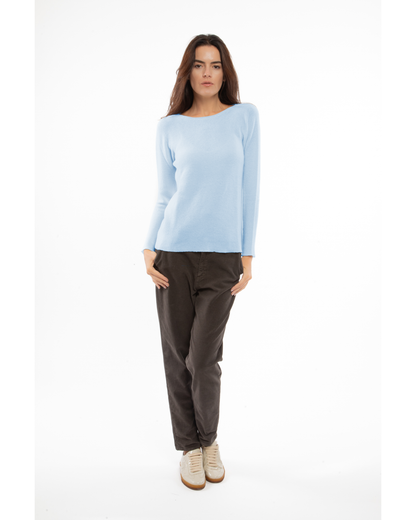 Baby Blue cashmere links stitch boat neck sweater, full-length outfit on a model, front view