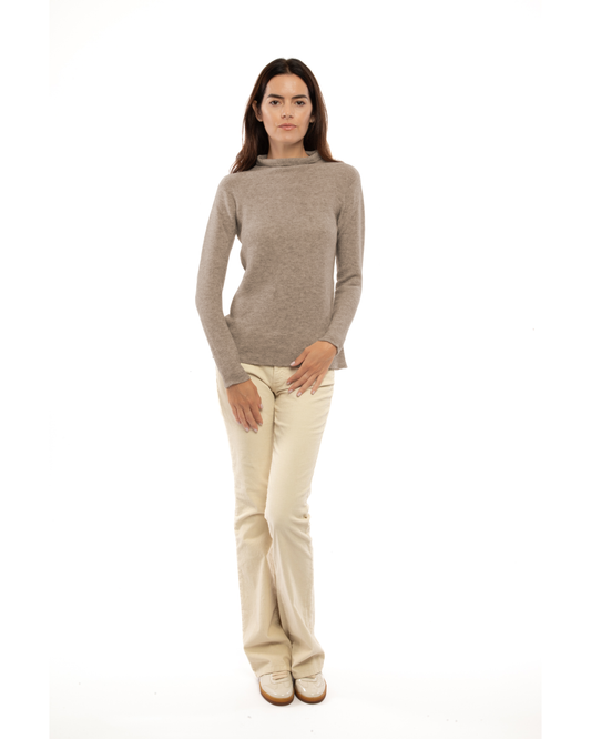 Women's cashmere links stitch funnel neck sweater in Taupe, full-length view on a model