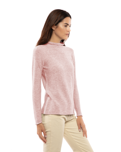 Women's cashmere links stitch funnel neck sweater in Old Rose, three-quarter view on a model
