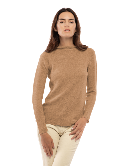 Women's cashmere links stitch funnel neck sweater in Camel, front view on a model