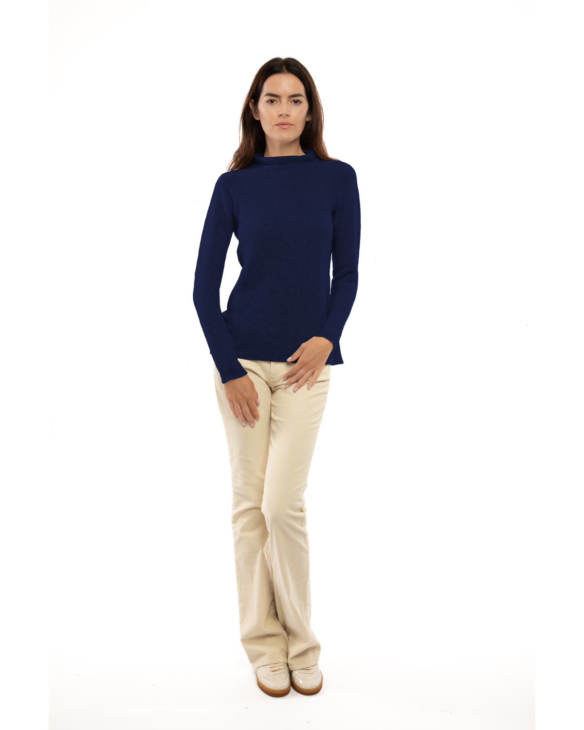 Women's cashmere links stitch funnel neck sweater in Blue, full-length view on a model