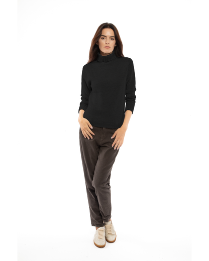 Women's classic cashmere turtleneck sweater in Black, full-length outfit view on a model
