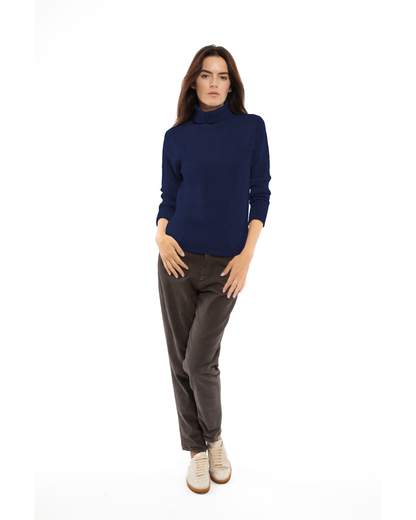 Women's classic cashmere turtleneck sweater in Blue, full-length outfit view on a model