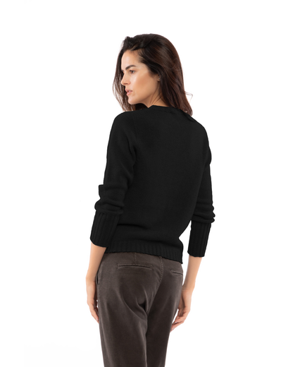 Back view of a model wearing a cashmere ribbed-trim crewneck sweater in black