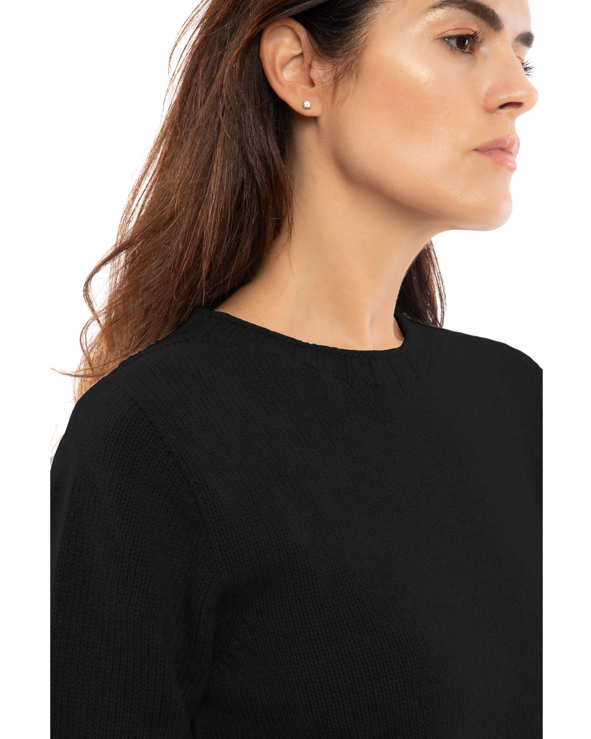 Close-up of a black cashmere sweater on a model, showing the ribbed crew neckline.