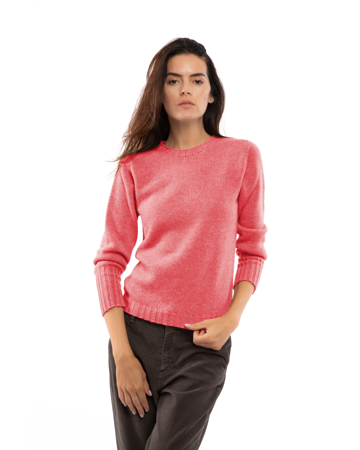 Coral red cashmere crewneck sweater with ribbed trim, shown from the front on a model.