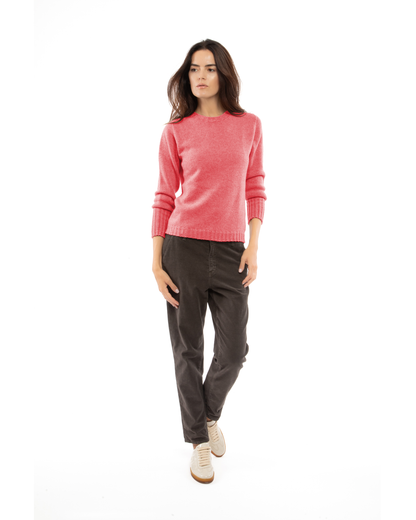 Model wearing the coral red cashmere crewneck sweater