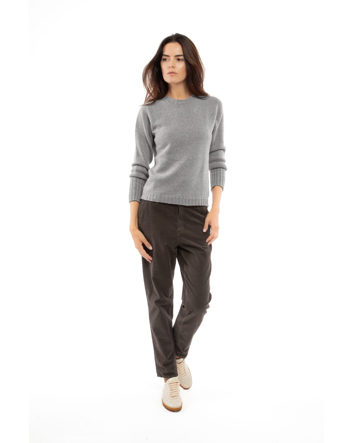 Melange gray cashmere crewneck sweater with ribbed trim, shown from the front on a model.