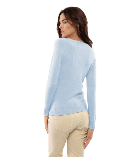 Baby blue cashmere raglan crewneck sweater, back view on a model.