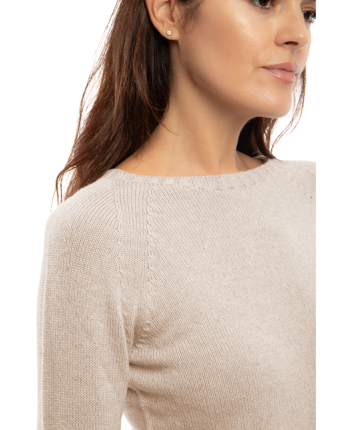 Close-up of the neckline of a cashmere raglan crewneck sweater in beige