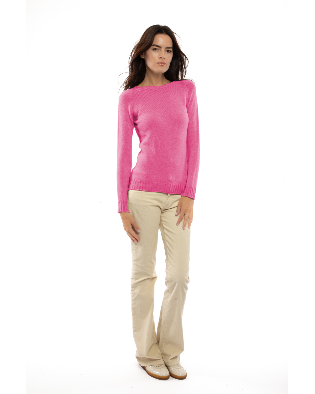 Model wearing the fuchsia cashmere raglan crewneck sweater