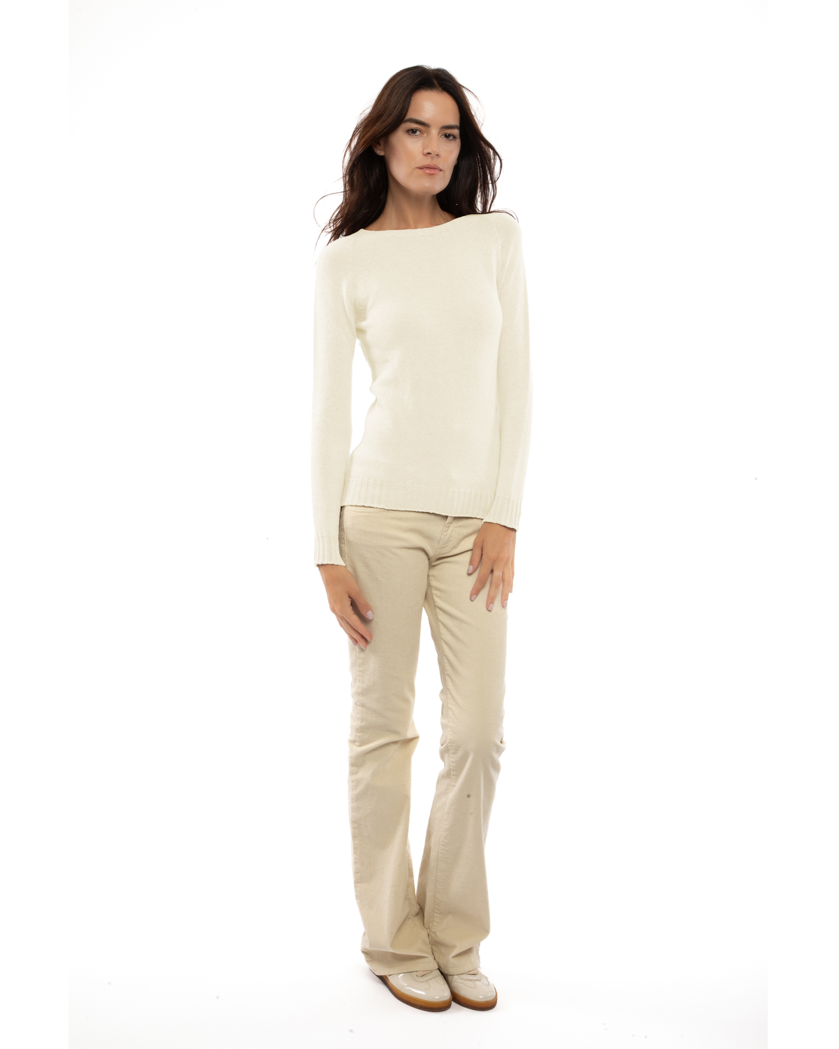 Model wearing the milk white cashmere raglan crewneck sweater