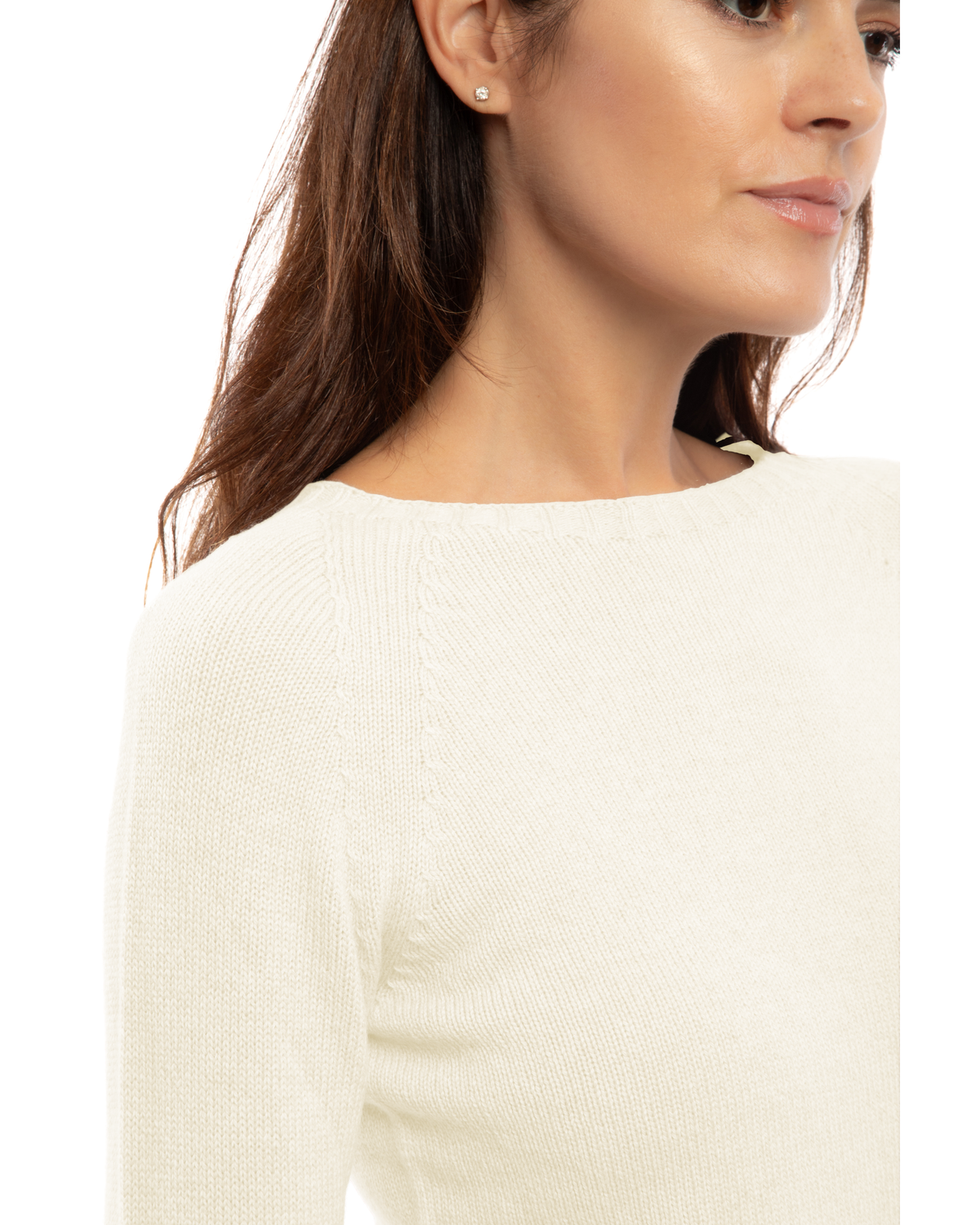 Close-up of the neckline of a cashmere raglan crewneck sweater in milk white