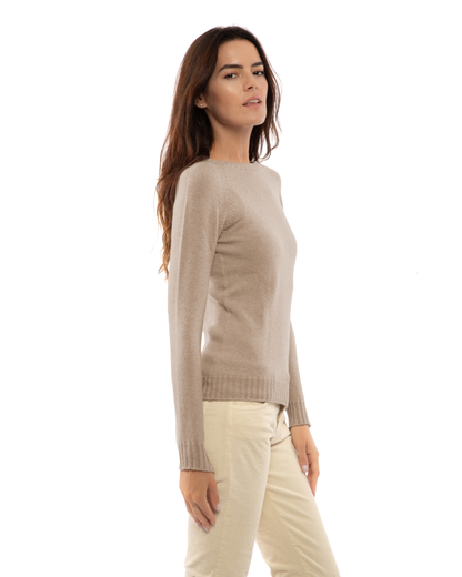 Taupe cashmere raglan crewneck sweater, shown from the side on a model.