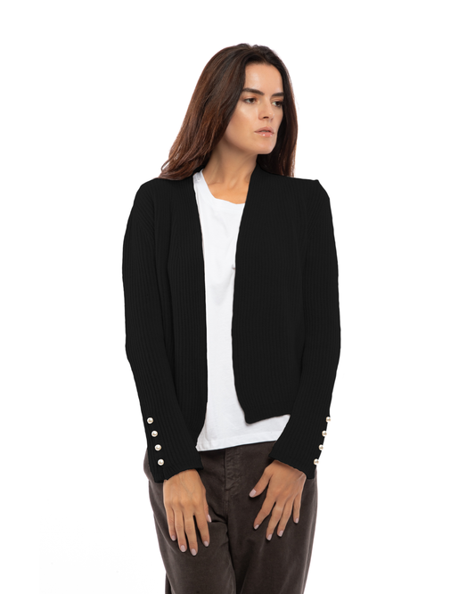 Front view of the black rib-knit cashmere blazer on a model