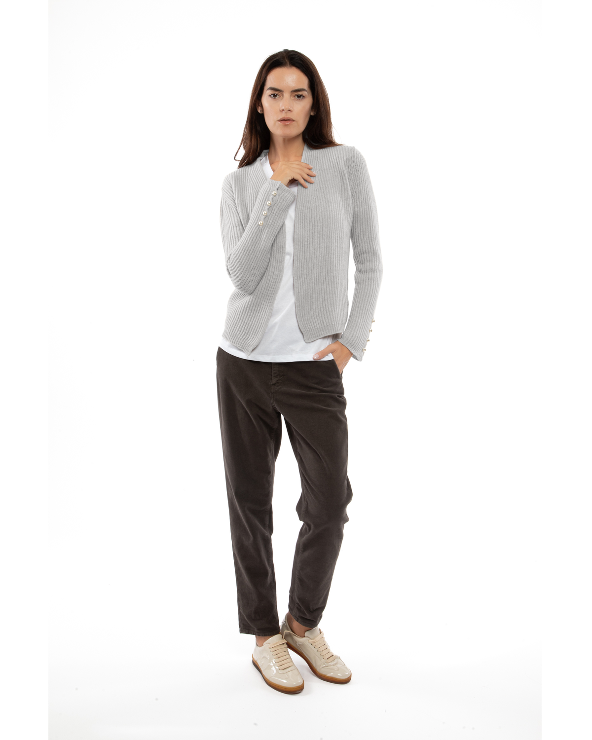 Model wearing a cashmere rib knit blazer in light gray, front view