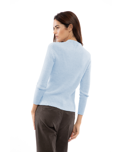 Back view of a model wearing a cashmere vertical rib crewneck sweater in baby blue
