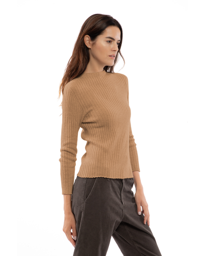 Model wearing a cashmere vertical rib crewneck sweater in camel, front view