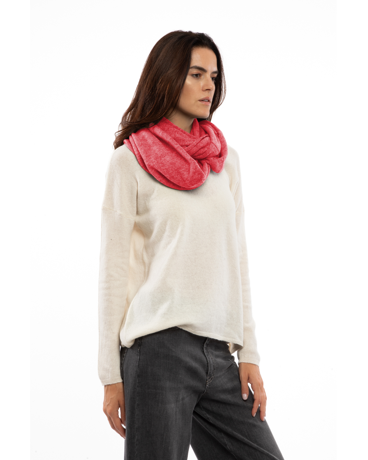 Model wearing a maxi cashmere infinity scarf in coral red, front view