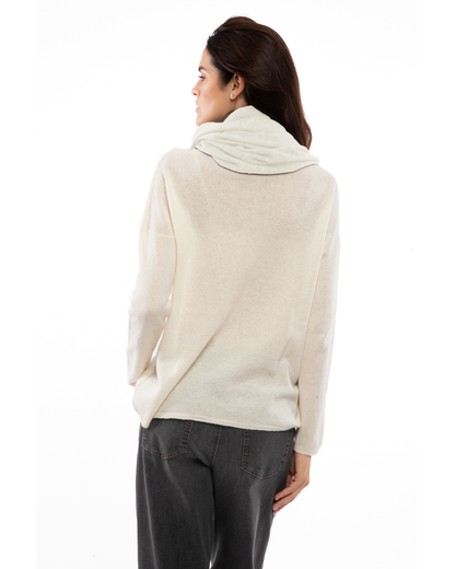 Milk white maxi cashmere infinity scarf worn around the neck with one end down the back