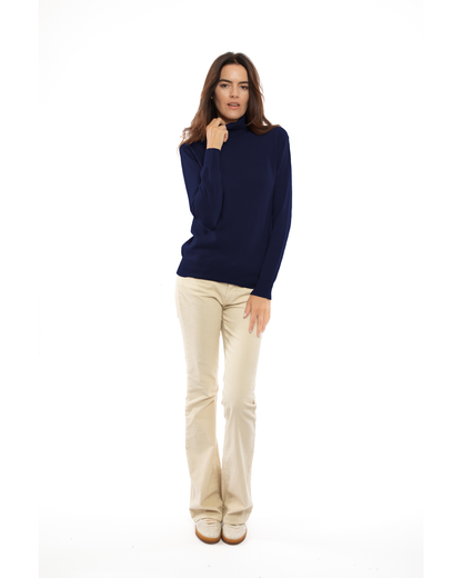 Women's cashmere turtleneck sweater in Blue, full-length front view on model
