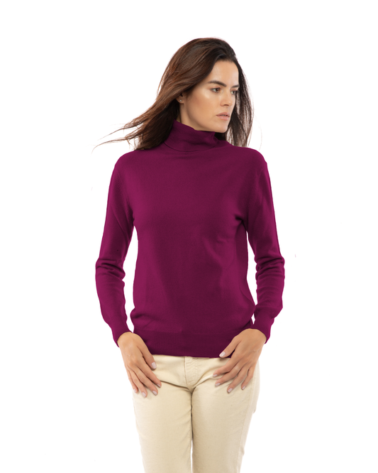 Women's cashmere turtleneck sweater in Magenta, front portrait view on model