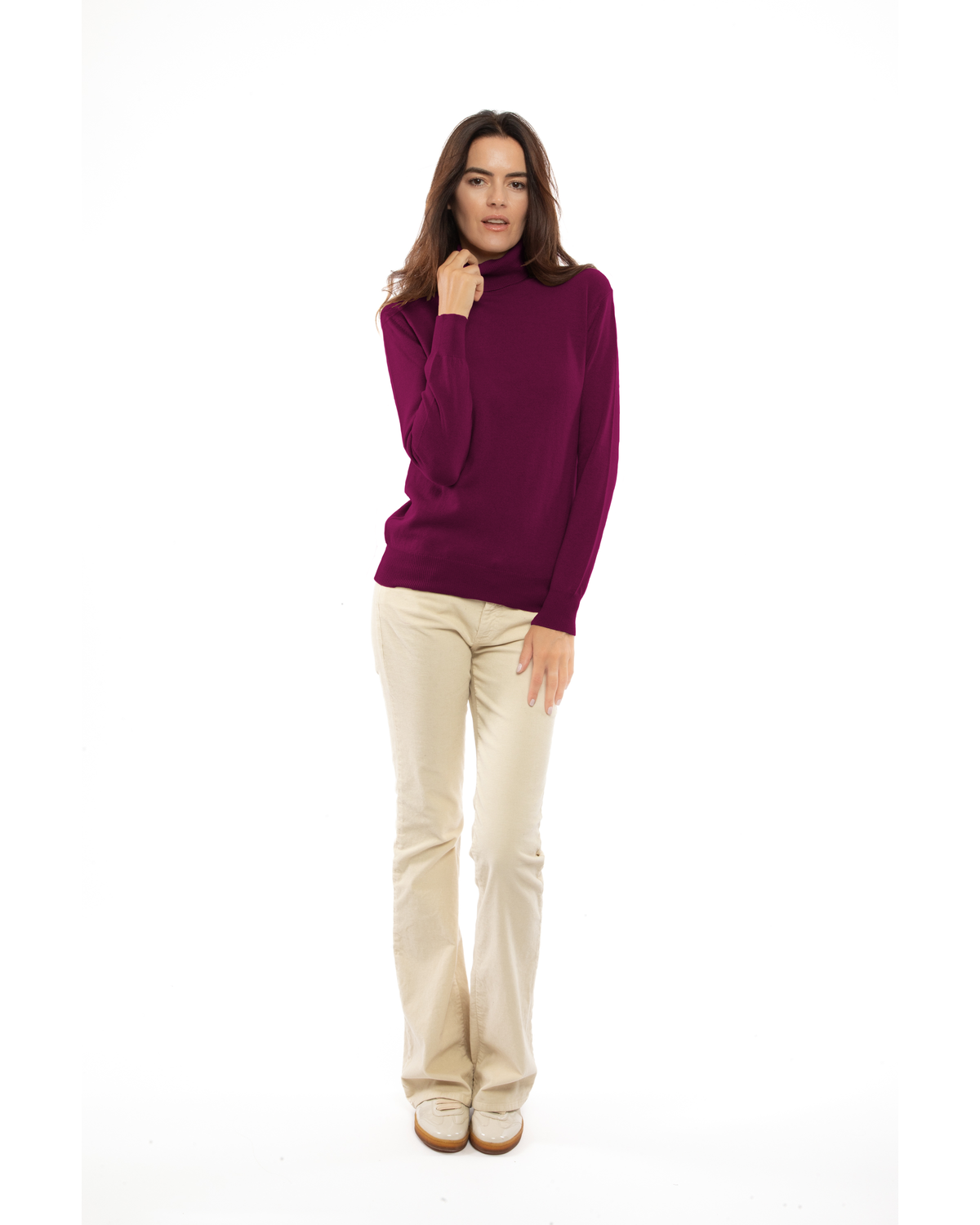 Women's cashmere turtleneck sweater in Magenta, full-length front view on model