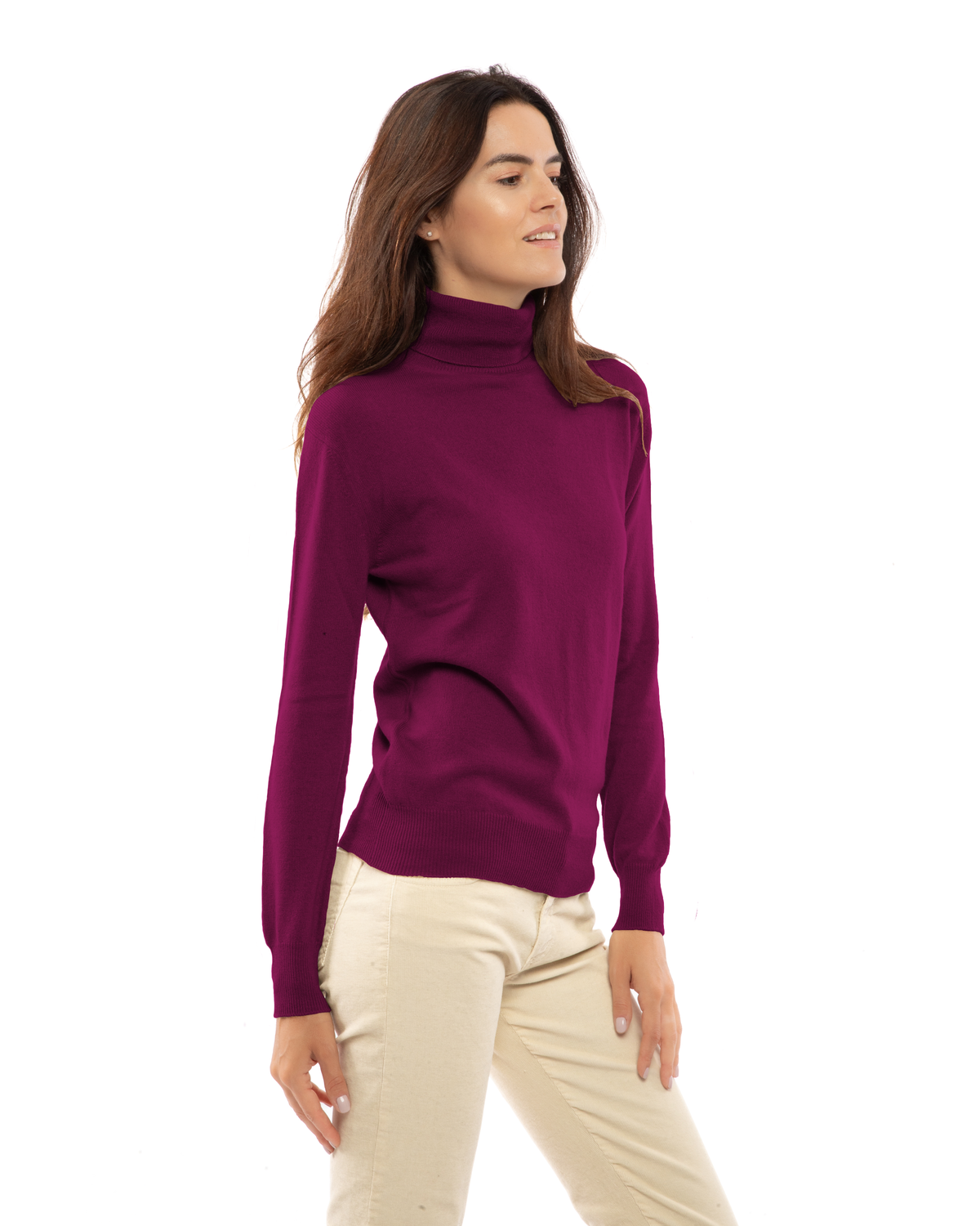 Women's cashmere turtleneck sweater in Magenta, three-quarter front view on model
